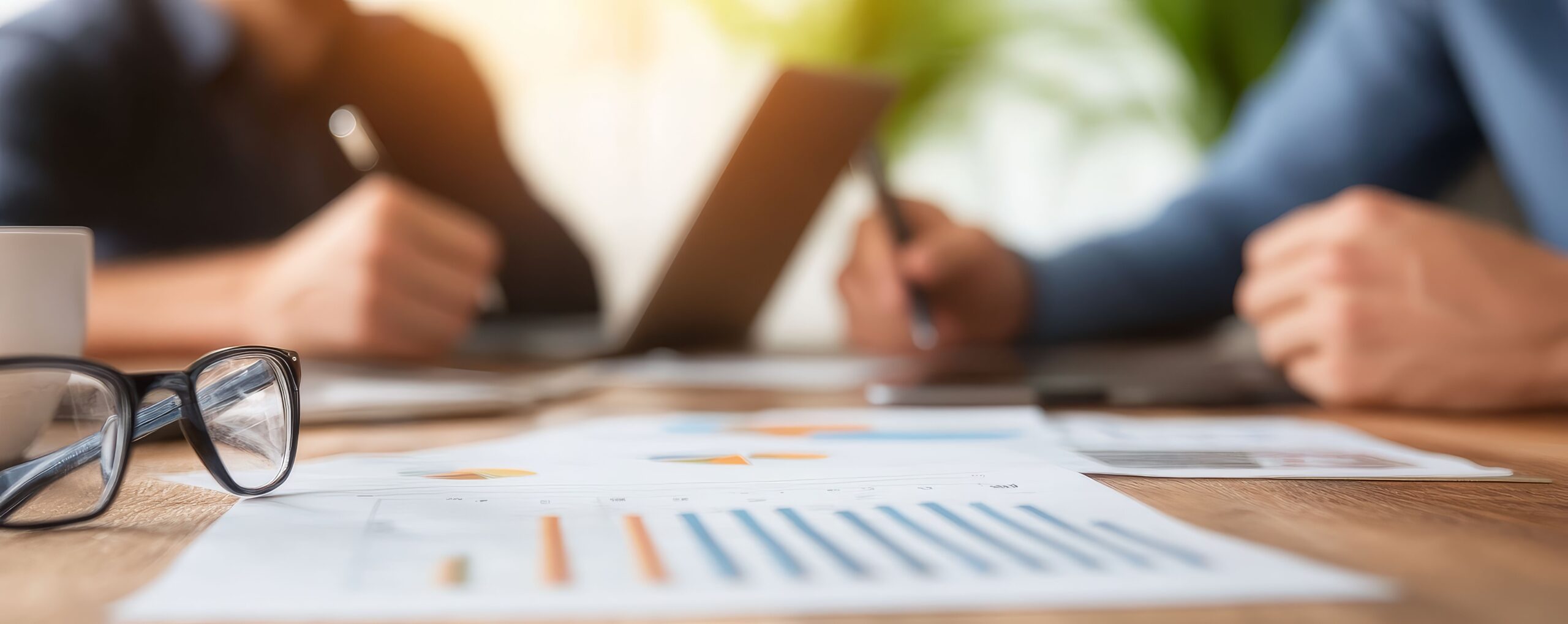 economic-team-studying-supply-trends-using-graphs-charts-strategy-meeting